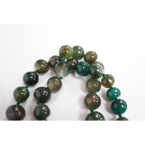 1410 - An early 20th century hardstone beaded necklace. Condition - fair