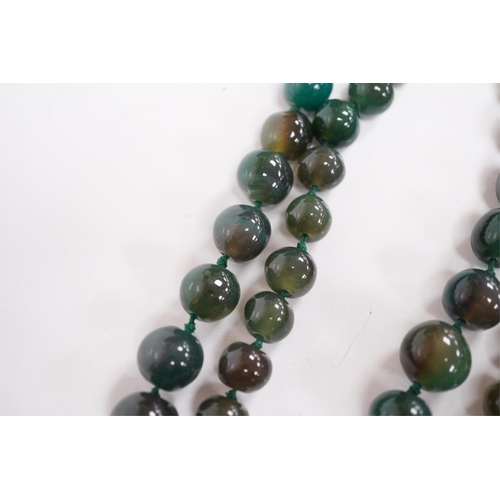 1410 - An early 20th century hardstone beaded necklace. Condition - fair