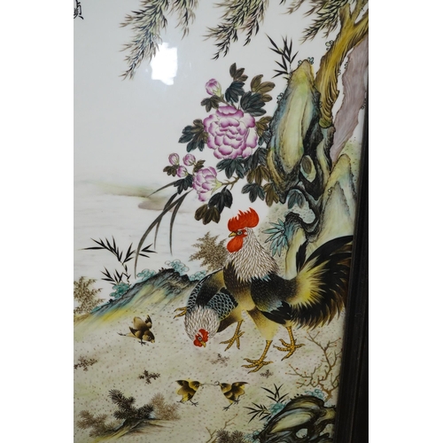 1418 - A Chinese famille rose porcelain plaque depicting cockerels and chicks before a landscape, signed wi... 