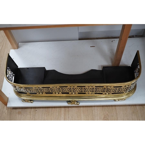 1419 - An early 19th century brass fender with pierced decoration, 91cm wide. Condition - fair to good... 