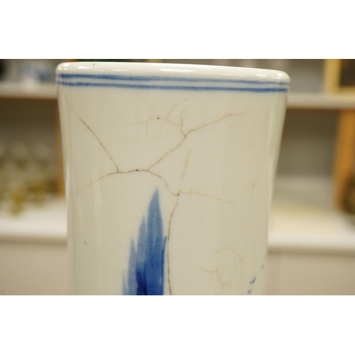 1429 - A Chinese blue and white bottle vase decorated with a landscape, 47cm high. Condition - poor