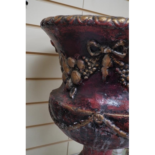 1433 - A large painted cast plaster urn, 59cm high. Condition - fair to good.