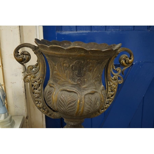 1437 - A large two colour bronze effect urn on pedestal, total height 134cm. Condition - fair to good... 