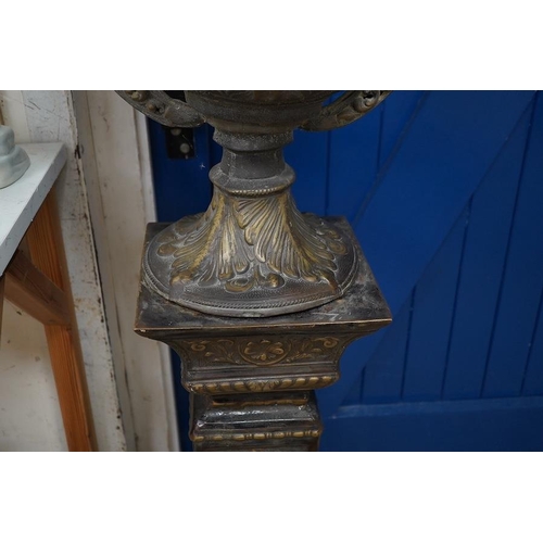 1437 - A large two colour bronze effect urn on pedestal, total height 134cm. Condition - fair to good... 