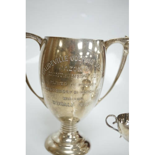 1827 - Five assorted small silver trophy cups including a pair by Edward Barnard & Sons, London, 1936, 12.7... 