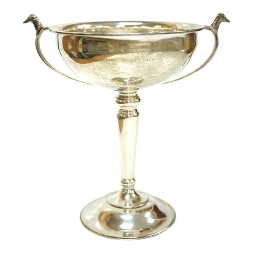 1829 - A 1930's silver two handled presentation greyhound trophy cup, with greyhound head handle terminals ... 