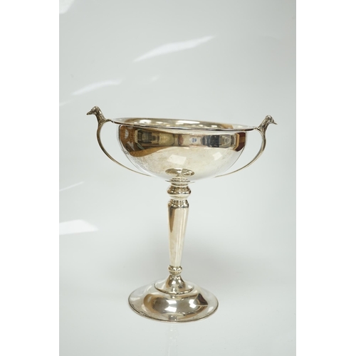 1829 - A 1930's silver two handled presentation greyhound trophy cup, with greyhound head handle terminals ... 