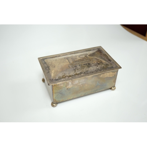 1832 - A George V Arts & Crafts silver mounted rectangular cigarette box, by Dryad Metal Works, Birmingham,... 