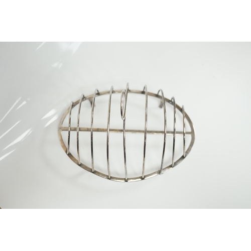 1841 - A George III silver oval nine bar toast rack by Robert & Samuel Hennell, with crescent ring handle, ... 