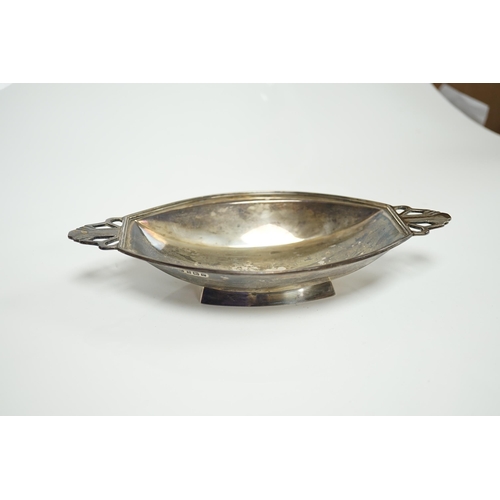 1844 - A George VI Art Deco silver two handled dish, Birmingham, 1939, 21.1cm, together with three assorted... 