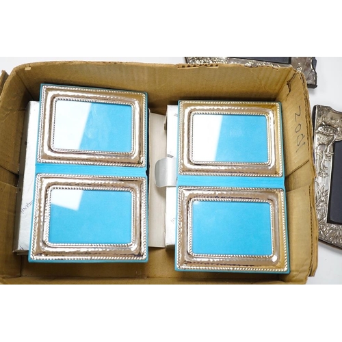 1850 - A pair of modern silver mounted 'Chinoiserie' photograph frames, London, 1986, 18.7cm, together with... 