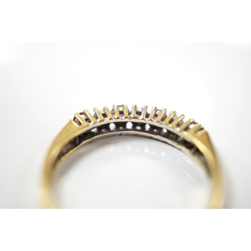 1903 - A modern 18ct gold, four stone ruby and three stone diamond set half hoop ring, size P, gross weight... 