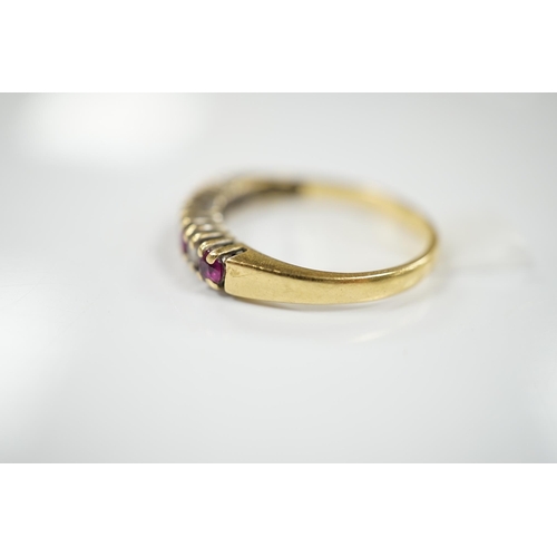 1903 - A modern 18ct gold, four stone ruby and three stone diamond set half hoop ring, size P, gross weight... 