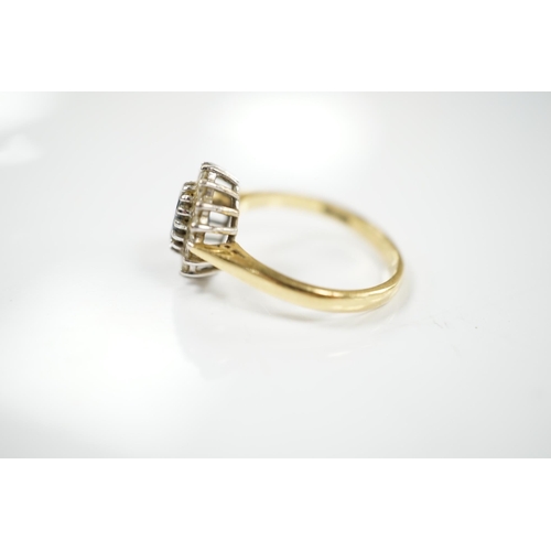 1910 - A modern 18ct gold, sapphire and diamond set oval cluster ring, size P/Q, gross weight 4.9 grams. Co... 