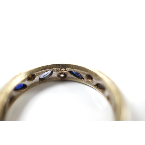 1911 - A 9ct white metal, shaped sapphire and diamond chip set eternity ring, size N, gross weight 3.7 gram... 