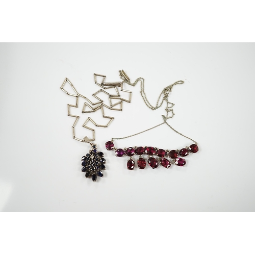 1914 - A white metal and garnet cluster set drop necklace, overall 48cm, together with a white metal, sapph... 