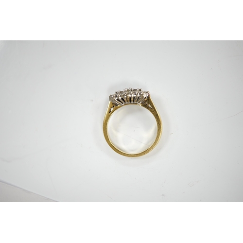 1920 - A modern 18ct gold and diamond cluster ring, size K, gross weight 4.4 grams. Condition - fair to goo... 