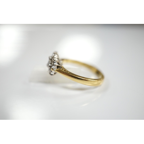 1920 - A modern 18ct gold and diamond cluster ring, size K, gross weight 4.4 grams. Condition - fair to goo... 