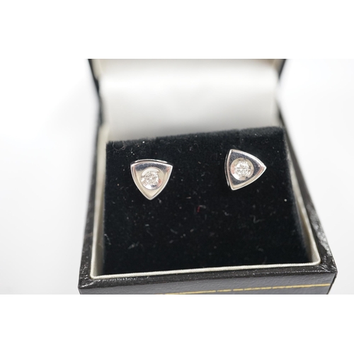 1921 - A modern pair of 18ct white gold and single stone diamond set ear studs, 6mm, gross weight 2.8 grams... 