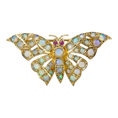 1922 - A modern 9ct gold and opal cluster set butterfly brooch, with ruby eyes, width 40mm, gross weight 4.... 