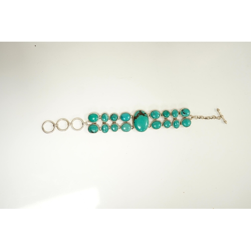 1926 - A modern silver and two row turquoise cluster set bracelet, overall 22cm. Condition - good