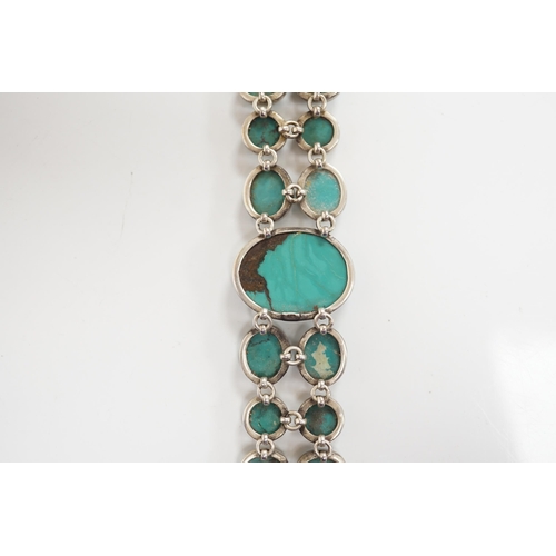 1926 - A modern silver and two row turquoise cluster set bracelet, overall 22cm. Condition - good