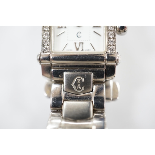 1927 - A lady's stainless steel Charriol Columbus quartz wrist watch with rectangular dial and diamond chip... 