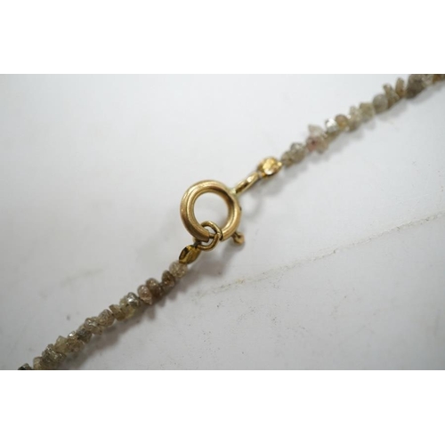 1934 - A single strand rough cut diamond necklace, with 750 yellow metal clasp, 40cm. Condition - fair... 