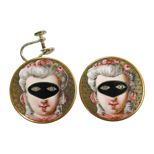 1937 - A pair of engraved gilt metal enamel and paste set disc shaped buttons )converted to earrings, one f... 