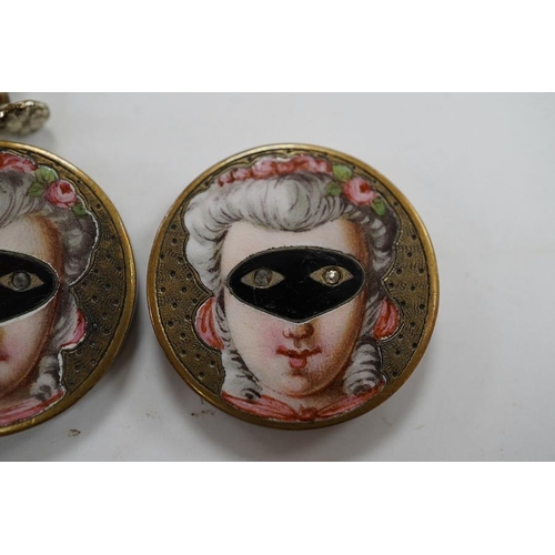 1937 - A pair of engraved gilt metal enamel and paste set disc shaped buttons )converted to earrings, one f... 