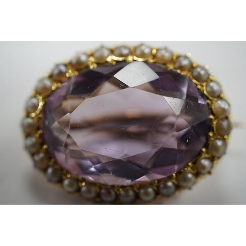 1938 - An Edwardian 15ct, amethyst and split pearl cluster set oval brooch, 23mm, gross weight 5 grams. Con... 