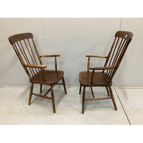 115 - A pair of mid 19th century ash, elm and beech Windsor comb back armchairs, width 52cm, depth 44cm, h... 