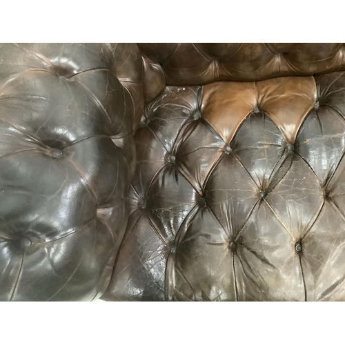 117 - An early 20th century buttoned brown leather Chesterfield sofa, width 200cm, depth 90cm, height 72cm... 