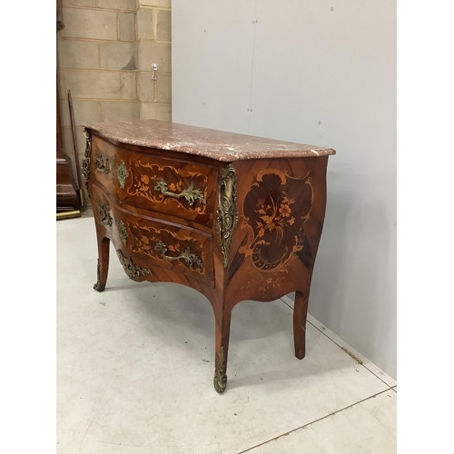 119 - A French gilt metal mounted and marquetry inlaid kingwood marble topped serpentine commode, width 11... 