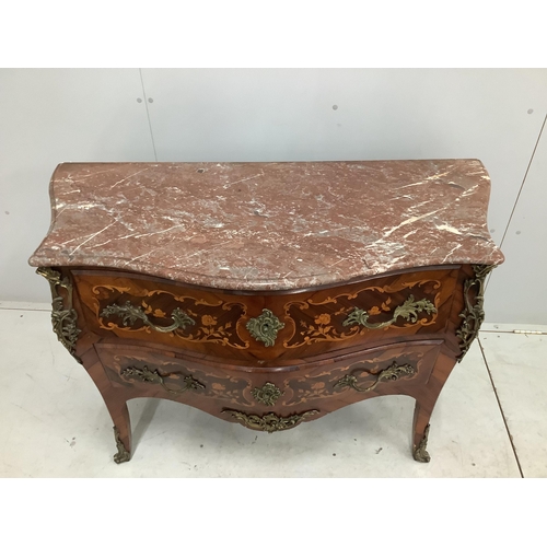 119 - A French gilt metal mounted and marquetry inlaid kingwood marble topped serpentine commode, width 11... 