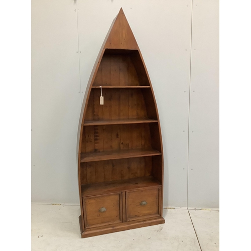 127 - A reproduction Barker and Stonehouse hardwood boat shaped two drawer bookcase, width 83cm, depth 32c... 