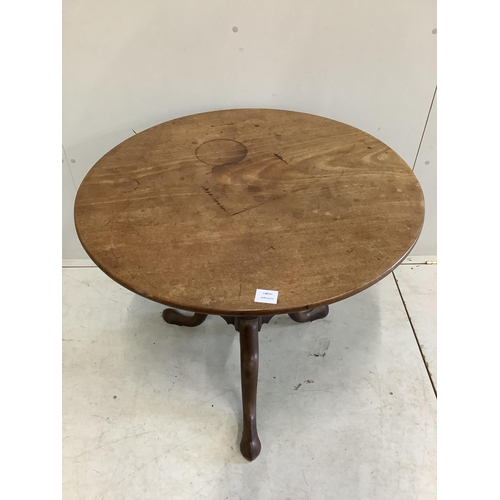 128 - A George III mahogany circular tilt top tea table, diameter 80cm, height 68cm. Condition - poor to f... 