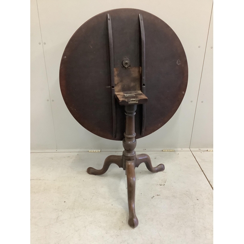 128 - A George III mahogany circular tilt top tea table, diameter 80cm, height 68cm. Condition - poor to f... 