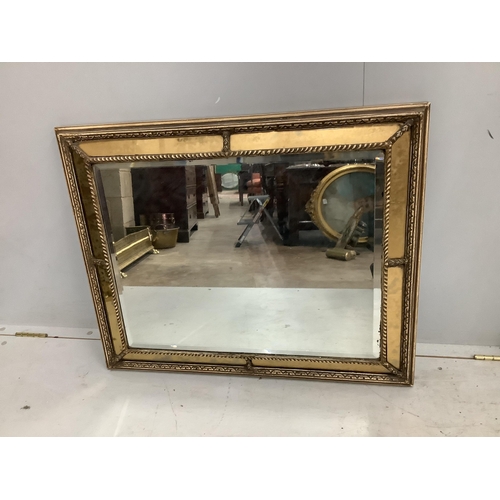 130 - A pair of Regency style rectangular giltwood and composition marginal plate cushion framed mirrors, ... 