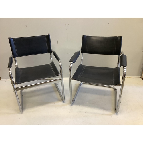 15 - A near pair of chrome and black leather cantilever chairs, width 61cm, depth 60cm, height 80cm. Cond... 