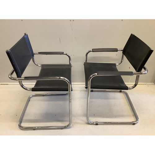 15 - A near pair of chrome and black leather cantilever chairs, width 61cm, depth 60cm, height 80cm. Cond... 