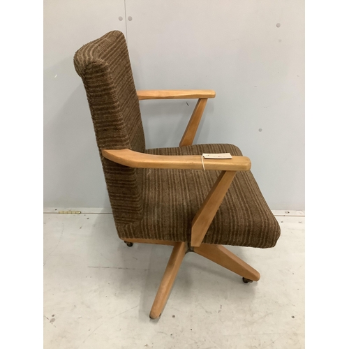 21 - A mid century swivel office chair, width 59cm, depth 45cm, height 88cm. Condition - fair