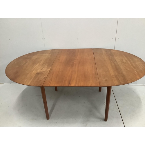 24 - Niels Otto Moller. A Danish teak dining table, width approx. 180cm extended, depth 115cm, height 73c... 