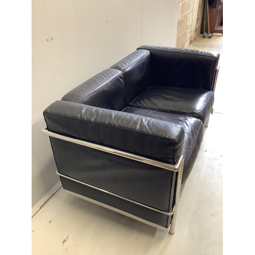 29 - A Le Corbusier style two seater settee, width 130cm, depth 70cm, height 64cm. Condition - fair... 