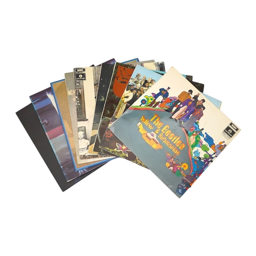 294 - Nine The Beatles and related LP record albums; Yellow Submarine, Sgt Pepper, Rubber Soul, Abbey Road... 