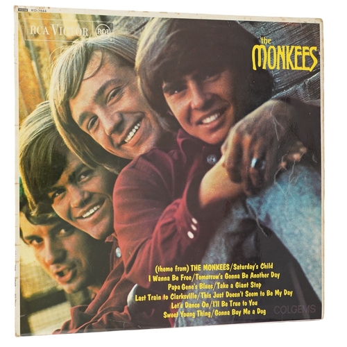 301 - Twenty-one LP record albums by The Monkees and The Moody Blues; Thirteen The Monkees Lips including;... 