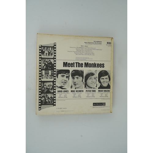 301 - Twenty-one LP record albums by The Monkees and The Moody Blues; Thirteen The Monkees Lips including;... 