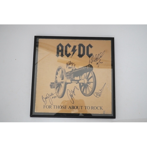 303 - A signed AC/DC album with five autographs of; Angus Young, Phil Rudd, Cliff Williams, Brian Johnson ... 