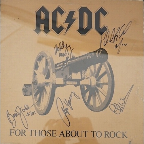 303 - A signed AC/DC album with five autographs of; Angus Young, Phil Rudd, Cliff Williams, Brian Johnson ... 