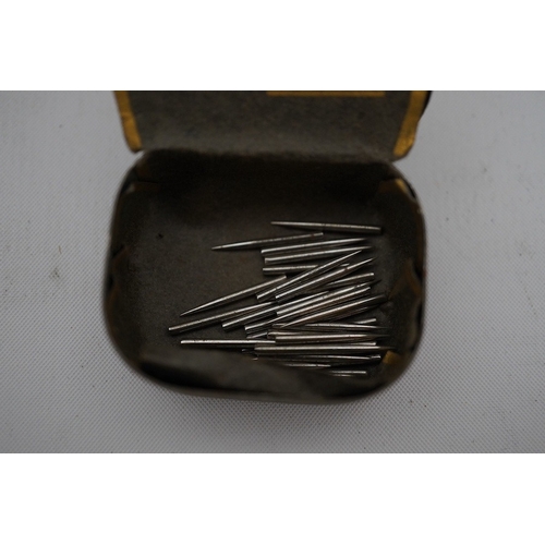 305 - A collection of gramophone needle cases, many with contents. Condition - fair.